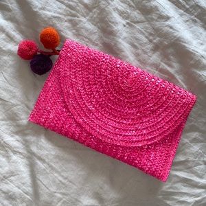 Pink straw purse with Pom poms